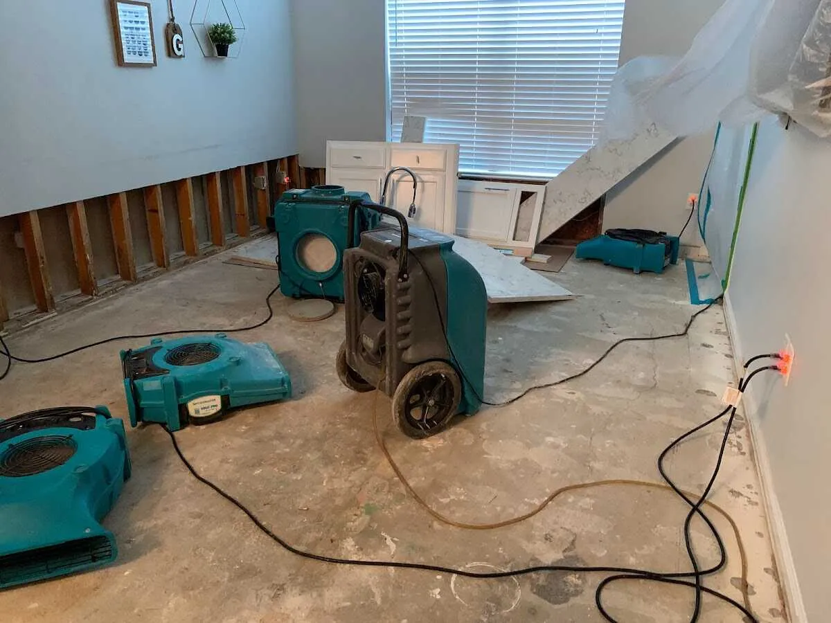 Dehumidifier in flood-cut room for Water Damage Restoration in Savannah